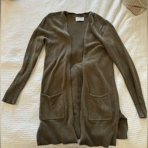 Olive green cardigan.